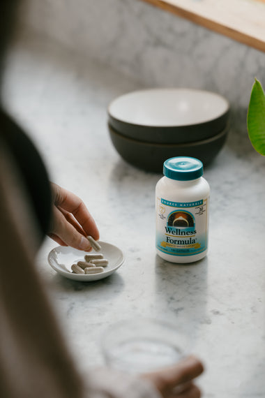 maybe an image about Wellness Formula® is an advanced, award-winning blend of over 30 vitamins, minerals, adaptogens, and herbs—including high potencies of vitamins A, C, D, and zinc—for powerful, comprehensive immune support at the first signs of imbalance.*